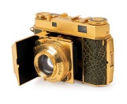 KODAK: Gold-plated Retina IIa&nbsp;rangefinder camera with snakeskin body, circa 1952, with Retina-Xenon 50mm f2 lens [#2938383] and&nbsp;Synchro-Compur&nbsp;shutter.