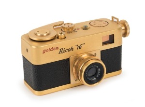 RIKEN OPTICAL: 1957 Golden Ricoh 16 subminiature camera for 25 exposures on 16mm film, with interchangeable Ricoh 25mm f3.5 lens, together with original leather body case. 