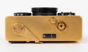 FRANKE & HEIDECKE: 1979 Rollei 35S compact camera [#0046/1500], in gold-plated edition marking the 60th anniversary of the Rollei company. In addition to being plated in 24-carat gold, the body is covered in lizard skin, bearing a uniquely numbered plate - 4