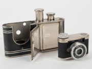WALTER KUNIK: Petie Vanity subminiature camera for 14x14 exposures on 16mm film, circa 1956, with chrome and marble-green body. Front door opens to reveal mirror and original powder pad, which is present. - 2