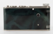 WALTER KUNIK: Petie Vanity subminiature camera for 14x14 exposures on 16mm film, circa 1956, with chrome and marble-green body. Front door opens to reveal mirror and original powder pad, which is present. - 4