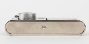 WALTER KUNIK: Petie Vanity subminiature camera for 14x14 exposures on 16mm film, circa 1956, with chrome and marble-green body. Front door opens to reveal mirror and original powder pad, which is present. - 6