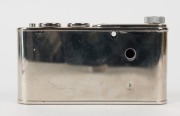 WALTER KUNIK: Petie Vanity subminiature camera for 14x14 exposures on 16mm film, circa 1956, with all-chrome body. Front door opens to reveal mirror and space for powder pad. - 4