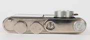 WALTER KUNIK: Petie Vanity subminiature camera for 14x14 exposures on 16mm film, circa 1956, with all-chrome body. Front door opens to reveal mirror and space for powder pad. - 5