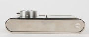 WALTER KUNIK: Petie Vanity subminiature camera for 14x14 exposures on 16mm film, circa 1956, with all-chrome body. Front door opens to reveal mirror and space for powder pad. - 6