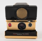 POLAROID: Limited-edition Polaroid SX-70 Land Camera Sonar AutoFocus [#65214600], circa 1981, with gold plating and leather body. - 3