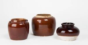 Three Chinese brown glazed jars, 20th century, largest 15cm high