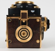 FRANKE & HEIDECKE: Rolleiflex&nbsp;2.8F 1983 Aurum Edition gold-plated commemorative TLR&nbsp;camera [#8300420], with Xenotar&nbsp;and&nbsp;Heidosmat&nbsp;80mm f2.8 lenses and&nbsp;alligator-leather covering. Presented in wooden maker's box with leather wrist strap. - 8