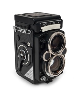 FRANKE & HEIDECKE: 1984 Rolleiflex 2.8F Platin Edition platinum-plated commemorative TLR camera [#2985085], with Zeiss Planar [#6886894] and Triotar [#6990777] 80mm f2.8 lenses, crocodile-leather covering, and 'Platin Edition' plaque that reads '085/500'.