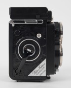 FRANKE & HEIDECKE: 1984 Rolleiflex&nbsp;2.8F&nbsp;Platin Edition platinum-plated commemorative&nbsp;TLR&nbsp;camera [#2985085], with&nbsp;Zeiss Planar&nbsp;[#6886894] and Triotar [#6990777] 80mm f2.8 lenses, crocodile-leather covering, and 'Platin Edition' plaque that reads&nbsp;'085/500'. - 3