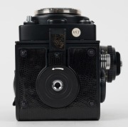 FRANKE & HEIDECKE: 1984 Rolleiflex&nbsp;2.8F&nbsp;Platin Edition platinum-plated commemorative&nbsp;TLR&nbsp;camera [#2985085], with&nbsp;Zeiss Planar&nbsp;[#6886894] and Triotar [#6990777] 80mm f2.8 lenses, crocodile-leather covering, and 'Platin Edition' plaque that reads&nbsp;'085/500'. - 7