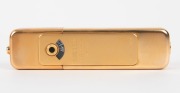 MINOX: 1988 limited-edition Minox LX Gold sub-miniature camera [#820-999]. Presented in original lined timber box with leather camera case, flash attachment in separate leather case, gold chain, and documentation. One of 999 such cameras produced to celeb - 6