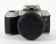 ASAHI KOGAKU: 1994 Pentax Z-1 SE Quartz Date 35mm SLR camera [#6377315], with Pentax-FA 28-80mm f3.5-4.7 lens [#3667349]. Featuring '75 years PENTAX' holographic label on right shoulder, this camera is finished in black and matte silver, and displayed in - 3