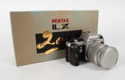 ASAHI KOGAKU: Pentax LX 2000 35mm SLR camera with leather-covered body [#2000723]. New in original box together with SMC PENTAX-A 50mm f1.2 Special lens [#1422163], strap, lens cap, instruction booklet, and other documentation. - 2