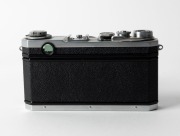 NIPPON KOGAKU: Circa 1956 Nikon S2 rangefinder camera [#6191136], with chrome-body and&nbsp;black dials,&nbsp;Nikkor-S&middot;C&nbsp;50mm f1.4 lens [#389561], and snap-on Nippon Kogaku&nbsp;lens hood. - 3