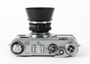 NIPPON KOGAKU: Circa 1956 Nikon S2 rangefinder camera [#6191136], with chrome-body and&nbsp;black dials,&nbsp;Nikkor-S&middot;C&nbsp;50mm f1.4 lens [#389561], and snap-on Nippon Kogaku&nbsp;lens hood. - 4