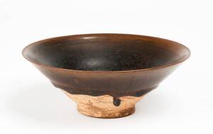 A fine and unusual Chinese black glazed conical shaped bowl, 17.8cm diameter
