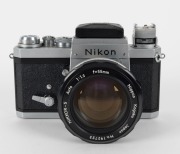 NIPPON KOGAKU: Early production model Nikon Ftn&nbsp;SLR camera [#6867522], circa 1968, with Nikkor-S Auto 55mm f1.2 lens [#192723] and Nikkon lens cap. - 2