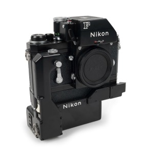 NIPPON KOGAKU: Black-body Nikon F Photomic FTn SLR camera [#7125665], circa 1971, fitted with Nikon motor drive [#141587] and power attachment [#87680].