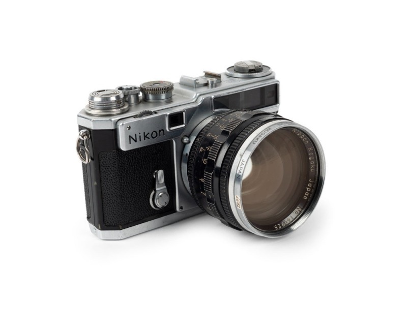 NIPPON KOGAKU: Nikon SP rangefinder camera [#6212936], circa 1959, with Nikkor-N 50mm f1.1 lens [#140925] and matching Nippon Kogaku L38 62mm UV filter.