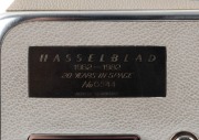 HASSELBLAD: 1982 Hasselblad 500EL/M '20 Years in Space' limited-edition medium-format SLR camera [#RH 1322394] in grey and chrome, with Planar 80mm f2.8 lens [#6388903] and Synchro-Compur shutter, together with front lens cap and power cable. Presented in - 4