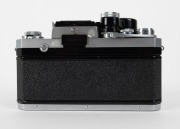 NIPPON KOGAKU: Early production 1960 Nikon F&nbsp;SLR camera [#6414686], with Micro-Nikkor&nbsp;55mm f3.5 lens [#173210], rear lens cap, and waist-level viewfinder attachment. - 3
