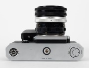 NIPPON KOGAKU: Early production 1960 Nikon F&nbsp;SLR camera [#6414686], with Micro-Nikkor&nbsp;55mm f3.5 lens [#173210], rear lens cap, and waist-level viewfinder attachment. - 5