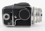 HASSELBLAD: Hasselblad 500C medium-format SLR camera [#TS 41148 & #CR 202739] in black and chrome, circa 1959, with Planar 80mm f2.8 lens [#1595573] and Synchro-Compur shutter, together with metal front lens cap and strap. - 4