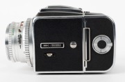 HASSELBLAD: Hasselblad 500C medium-format SLR camera [#TS 41148 & #CR 202739] in black and chrome, circa 1959, with Planar 80mm f2.8 lens [#1595573] and Synchro-Compur shutter, together with metal front lens cap and strap. - 5