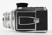 HASSELBLAD: Hasselblad 500C medium-format SLR camera [#TS 41148 & #CR 202739] in black and chrome, circa 1959, with Planar 80mm f2.8 lens [#1595573] and Synchro-Compur shutter, together with metal front lens cap and strap. - 6