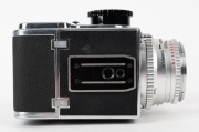 HASSELBLAD: Hasselblad 500C medium-format SLR camera [#TS 41148 & #CR 202739] in black and chrome, circa 1959, with Planar 80mm f2.8 lens [#1595573] and Synchro-Compur shutter, together with metal front lens cap and strap. - 7