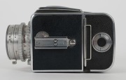 HASSELBLAD: Hasselblad 1600F medium-format SLR camera [#CH 12702 & #CH 14224] in black and chrome, circa 1952, with Ektar 80mm f2.8 lens [#RY263], Hasselblad-Y 1.5-50 lens filter, and carry strap. - 6