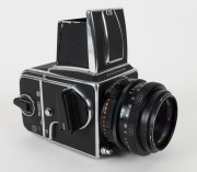 HASSELBLAD: Hasselblad 2000FC medium-format SLR camera [#RV 1514233 & #RP 3240019] in black and chrome, circa 1980, with Planar 80mm f2.8 lens [#5871879]. - 2