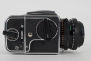 HASSELBLAD: Hasselblad 2000FC medium-format SLR camera [#RV 1514233 & #RP 3240019] in black and chrome, circa 1980, with Planar 80mm f2.8 lens [#5871879]. - 4