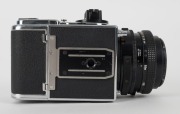 HASSELBLAD: Hasselblad 2000FC medium-format SLR camera [#RV 1514233 & #RP 3240019] in black and chrome, circa 1980, with Planar 80mm f2.8 lens [#5871879]. - 7