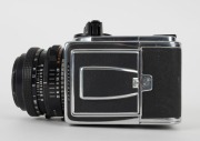 HASSELBLAD: Hasselblad 2000FC medium-format SLR camera [#RV 1514233 & #RP 3240019] in black and chrome, circa 1980, with Planar 80mm f2.8 lens [#5871879]. - 8