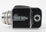 HASSELBLAD: Hasselblad 1000F medium-format SLR camera [#CT 20461 & #CT 27829] in black and chrome, circa 1956, with Tessar 80mm f2.8 lens [#587778] and lens filter. - 4