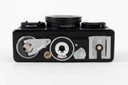 FRANKE & HEIDECKE: Black-body Rollei 35S compact camera, circa 1979, with Sonnar 40mm f2.8 lens [#2326340] and plastic lens cap. - 5