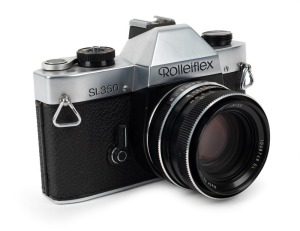 FRANKE & HEIDECKE: Circa 1975 Rolleiflex SL350 SLR camera [#4503283] with Planar 50mm f1.8 lens [#1048748 SL] and front lens cap.