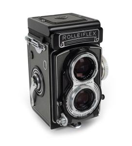 FRANKE & HEIDECKE: Rolleiflex T TLR camera [#T 2117736], circa 1958, with Tessar 75mm f3.5 lens [#1901551] and Synchro-Compur shutter.