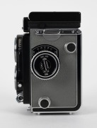 FRANKE & HEIDECKE: Rolleiflex T TLR camera [#T 2117736], circa 1958, with Tessar 75mm f3.5 lens [#1901551] and Synchro-Compur shutter. - 3