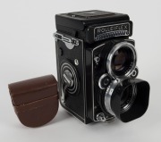 FRANKE & HEIDECKE:&nbsp;Rolleiflex&nbsp;2.8F&nbsp;TLR&nbsp;camera [#2437235], circa 1963, with Planar 80mm f2.8 lens [#3939604] and&nbsp;Synchro-Compur&nbsp;shutter, with metal lens hood in leather maker's pouch. - 2