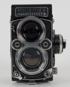 FRANKE & HEIDECKE:&nbsp;Rolleiflex&nbsp;2.8F&nbsp;TLR&nbsp;camera [#2437235], circa 1963, with Planar 80mm f2.8 lens [#3939604] and&nbsp;Synchro-Compur&nbsp;shutter, with metal lens hood in leather maker's pouch. - 3