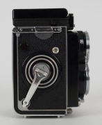 FRANKE & HEIDECKE:&nbsp;Rolleiflex&nbsp;2.8F&nbsp;TLR&nbsp;camera [#2437235], circa 1963, with Planar 80mm f2.8 lens [#3939604] and&nbsp;Synchro-Compur&nbsp;shutter, with metal lens hood in leather maker's pouch. - 4