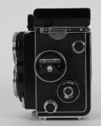 FRANKE & HEIDECKE:&nbsp;Rolleiflex&nbsp;2.8F&nbsp;TLR&nbsp;camera [#2437235], circa 1963, with Planar 80mm f2.8 lens [#3939604] and&nbsp;Synchro-Compur&nbsp;shutter, with metal lens hood in leather maker's pouch. - 6