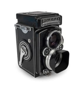 FRANKE & HEIDECKE: Rolleiflex 3.5E TLR camera [#1786612], circa 1956, with Planar 75mm f3.5 lens [#1785544] and Synchro-Compur shutter, with metal lens hood.