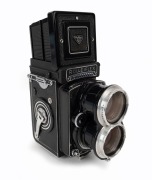 FRANKE & HEIDECKE: Tele Rolleiflex&nbsp;TLR&nbsp;camera [#S 2300397], circa 1959, with Sonnar&nbsp;135mm f4 lens [#2719295] and&nbsp;Synchro-Compur&nbsp;shutter, with Rolleinar&nbsp;RIII double-lens filter attachment.