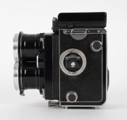 FRANKE & HEIDECKE: Tele Rolleiflex&nbsp;TLR&nbsp;camera [#S 2300397], circa 1959, with Sonnar&nbsp;135mm f4 lens [#2719295] and&nbsp;Synchro-Compur&nbsp;shutter, with Rolleinar&nbsp;RIII double-lens filter attachment. - 3