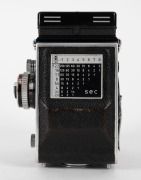 FRANKE & HEIDECKE: Tele Rolleiflex&nbsp;TLR&nbsp;camera [#S 2300397], circa 1959, with Sonnar&nbsp;135mm f4 lens [#2719295] and&nbsp;Synchro-Compur&nbsp;shutter, with Rolleinar&nbsp;RIII double-lens filter attachment. - 4
