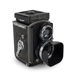 FRANKE & HEIDECKE: Rolleiflex 4x4 Sport 'Baby' TLR camera [#642259], circa 1938, with Tessar 60mm f2.8 lens [#2096981] and Compur-Rapid shutter, with metal lens hood.